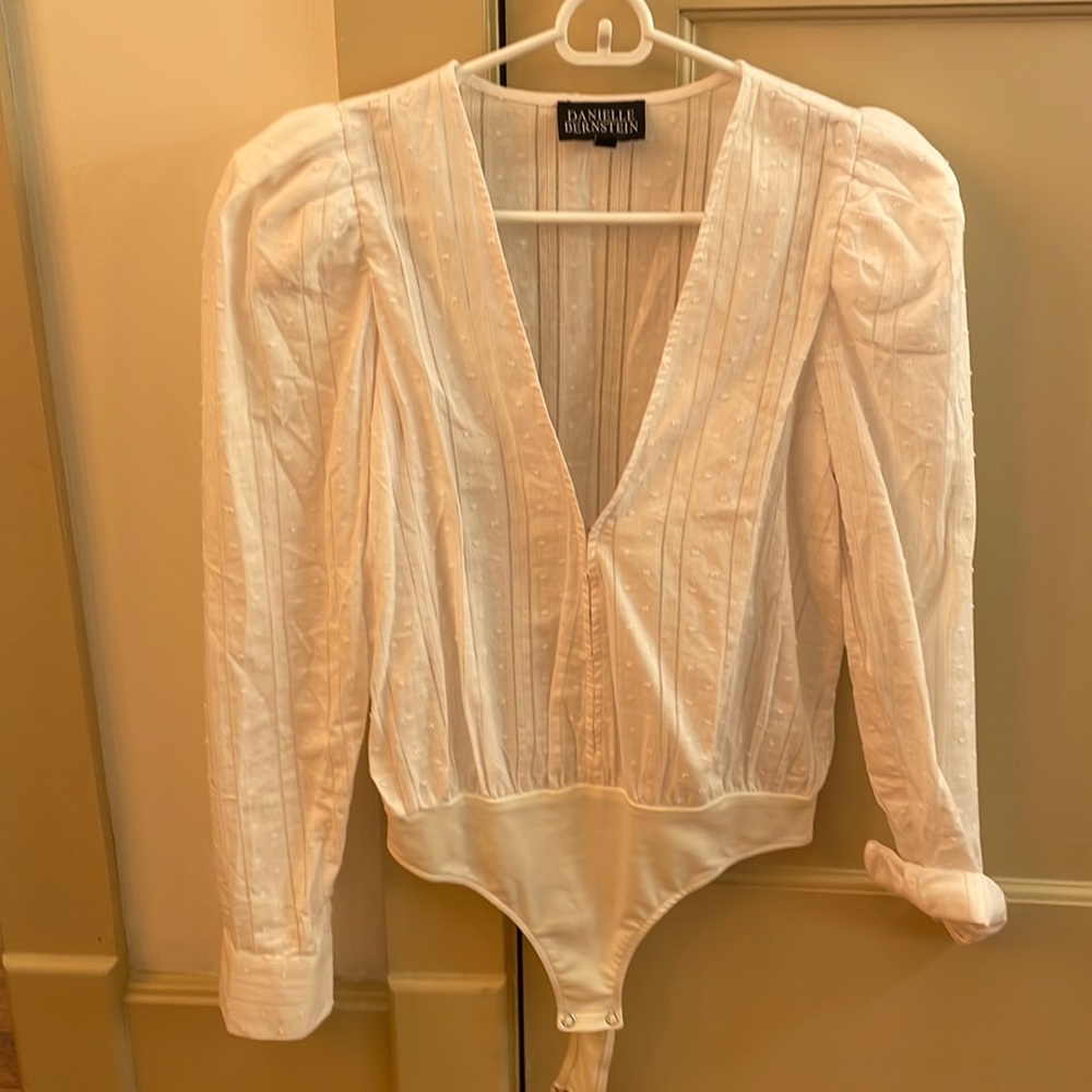 Danielle Bernstein for Macys white body suit. Puffy sleeves